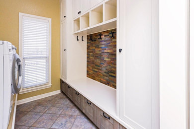 Example of a farmhouse laundry room design in Austin