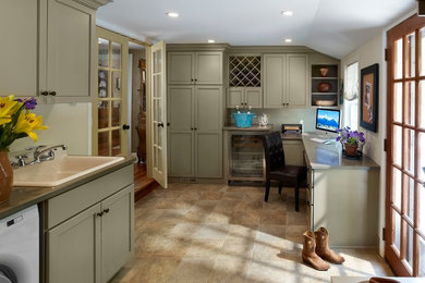 Inspiration for a huge timeless terra-cotta tile utility room remodel in Philadelphia with an utility sink, green cabinets, quartz countertops, beige walls and a side-by-side washer/dryer