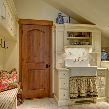 Laundry/Mudroom storage with farm sink