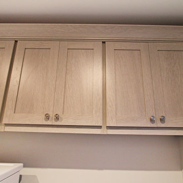 Laundry Room Cabinets with Natural Wood Finish