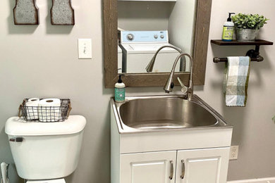 Inspiration for a laundry room remodel in Other