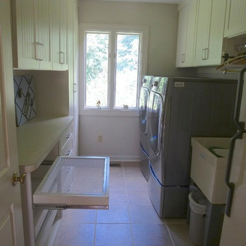 Laundry Room with Custom Slide-out Drying Racks