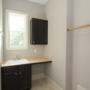 Laundry Room with Sink and Hanging Rod