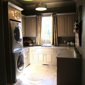 Laundry Room with Stacked Washer/Dryer, Sink and Window