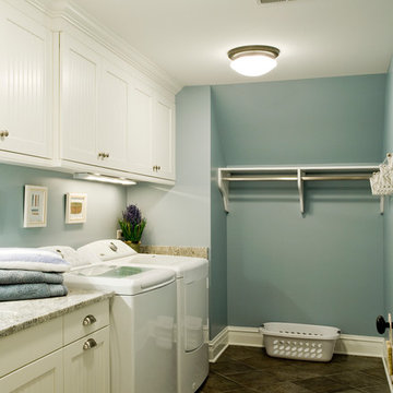 Laundry Room with White Recessed Panel Beadboard Cabinets