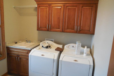 Inspiration for a transitional laundry room remodel in Milwaukee