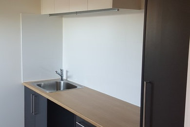 This is an example of a modern utility room in Adelaide.