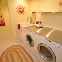 Traditional Laundry Room by The Design Den Homes Inc.