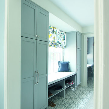 Light Blue Cabinets in Mudroom with Patterned Floor Tile