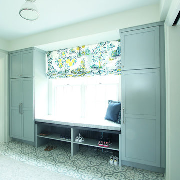 Light Blue Cabinets in Mudroom with Patterned Floor Tile