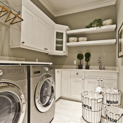 Elegant laundry room photo in Edmonton with gray walls