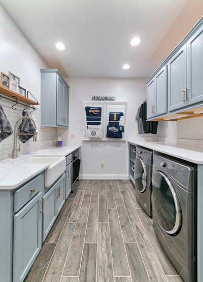 Transitional Laundry Room by Excel Interior Concepts & Construction