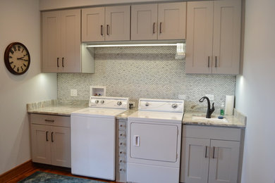 Example of a trendy laundry room design in Chicago