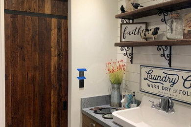 Cottage laundry room photo in Calgary