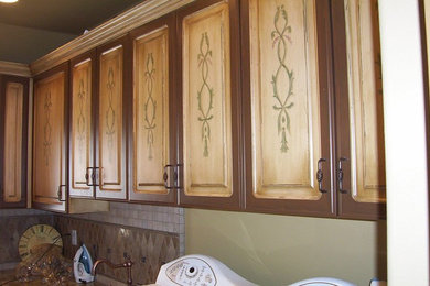 Example of a tuscan laundry room design in Other