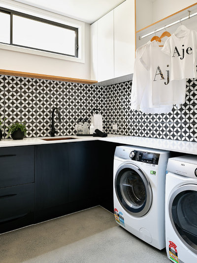 Contemporary Laundry Room by Corella Construction