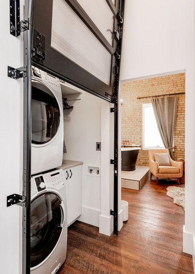 Industrial Laundry Room by Haven & Co.