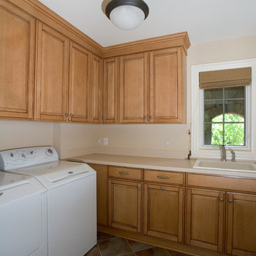 Second Floor Laundry Room with Light Stained Maple Raised Panel Cabinetry and So