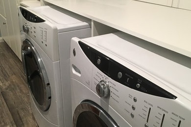 Example of a transitional laundry room design in Los Angeles