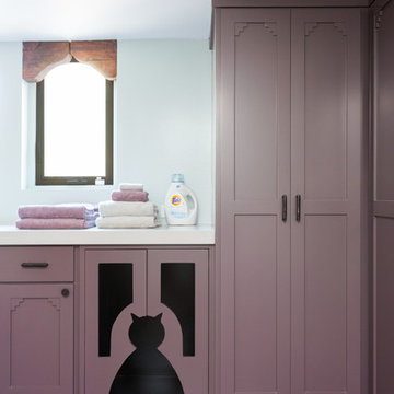 Spanish Castle Colorful Laundry Room with Cat Door