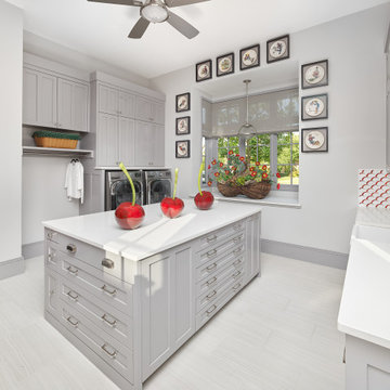 Storage Drawers, Sink and Island in Multi-Purpose Laundry Room