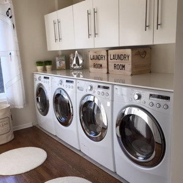 Super efficient 2 Washer and Dryer Laundry Room.