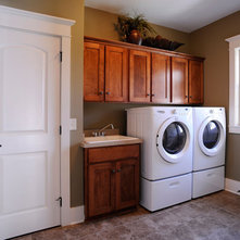 Rustic Laundry Room by Weaver Custom Homes