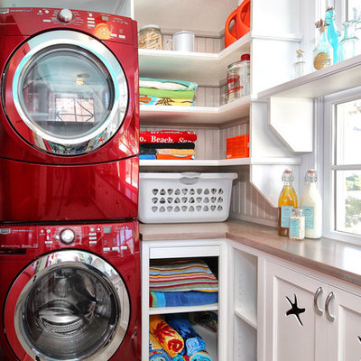 Inspiration for a timeless laundry room remodel in Philadelphia with a stacked washer/dryer