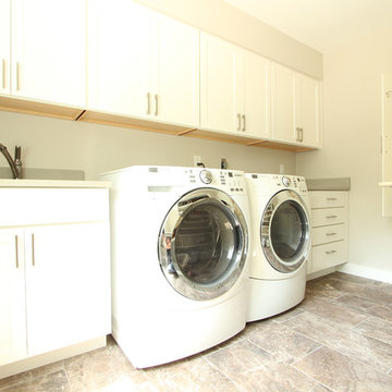 Utility sink next side by side washer and dryer