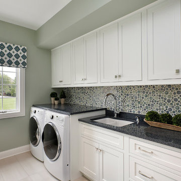 White Laundry Room with Blue and Green Accents, Custom Tile Backsplash,