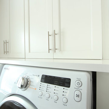 Wood Countertop Above Side by Side Washer and Dryer
