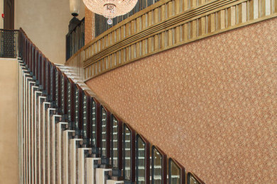 Example of a large trendy curved staircase design in Moscow