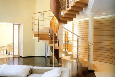 Стильный дизайн: большая винтовая лестница в современном стиле - последний тренд