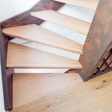 Консольная лестница с отделкой из ржавчины и ступенями Baubuche