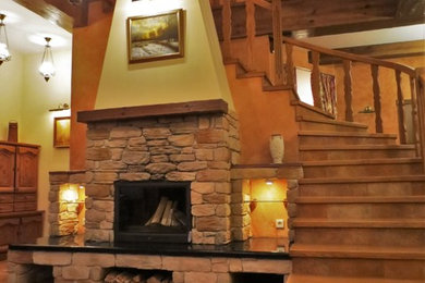 Example of a mountain style staircase design in Other