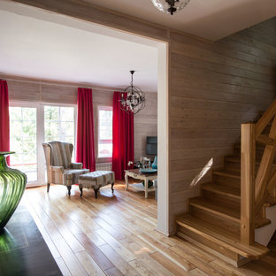 Foto de escalera en U, de estilo de casa de campo, pequeña, con escalones de madera y contrahuellas de madera