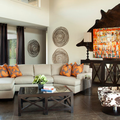 Example of an eclectic living room design in Other with white walls