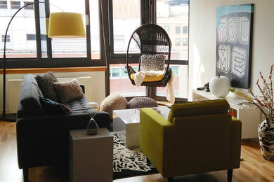 Living room - small contemporary open concept light wood floor and brown floor living room idea in Kansas City with beige walls, a standard fireplace and a metal fireplace