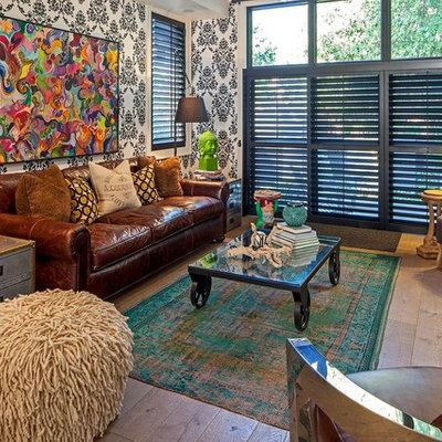 Eclectic enclosed living room photo in Toronto with no tv