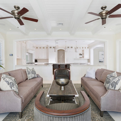 Inspiration for a tropical formal and open concept gray floor and ceramic tile living room remodel in Other with beige walls and no tv