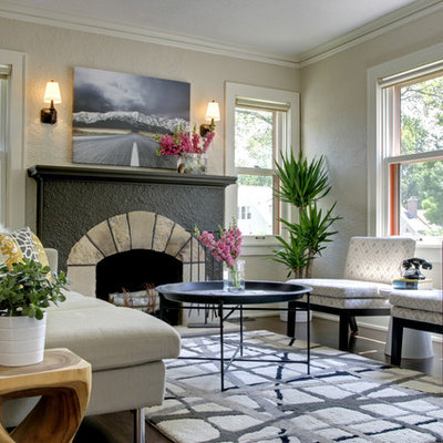 Trendy living room photo in Minneapolis with beige walls and a standard fireplace