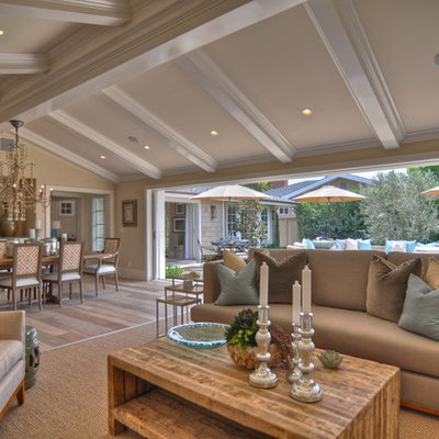 Beach style open concept living room photo in Los Angeles with beige walls