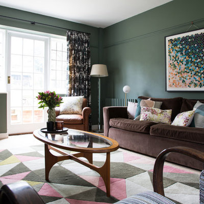 Living room - transitional living room idea in Kent with green walls