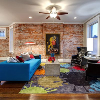 Inspiration for a contemporary dark wood floor living room remodel in St Louis with no fireplace
