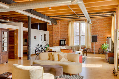 Photo of a contemporary living room in Detroit with white walls.