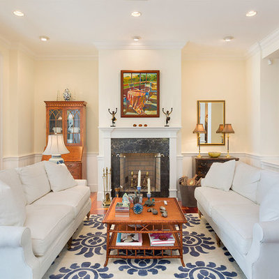 Mid-sized island style formal and open concept medium tone wood floor and brown floor living room photo in Other with beige walls, a standard fireplace, a stone fireplace and no tv