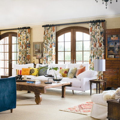 Inspiration for a timeless carpeted living room remodel in Denver with beige walls