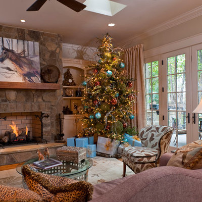 Living room - traditional living room idea in Other with beige walls and a standard fireplace