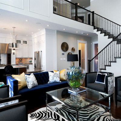 Trendy open concept living room photo in Other with white walls