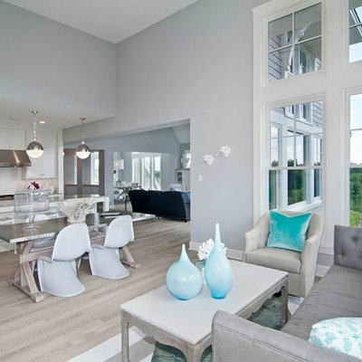 Example of a transitional living room design in Minneapolis with gray walls